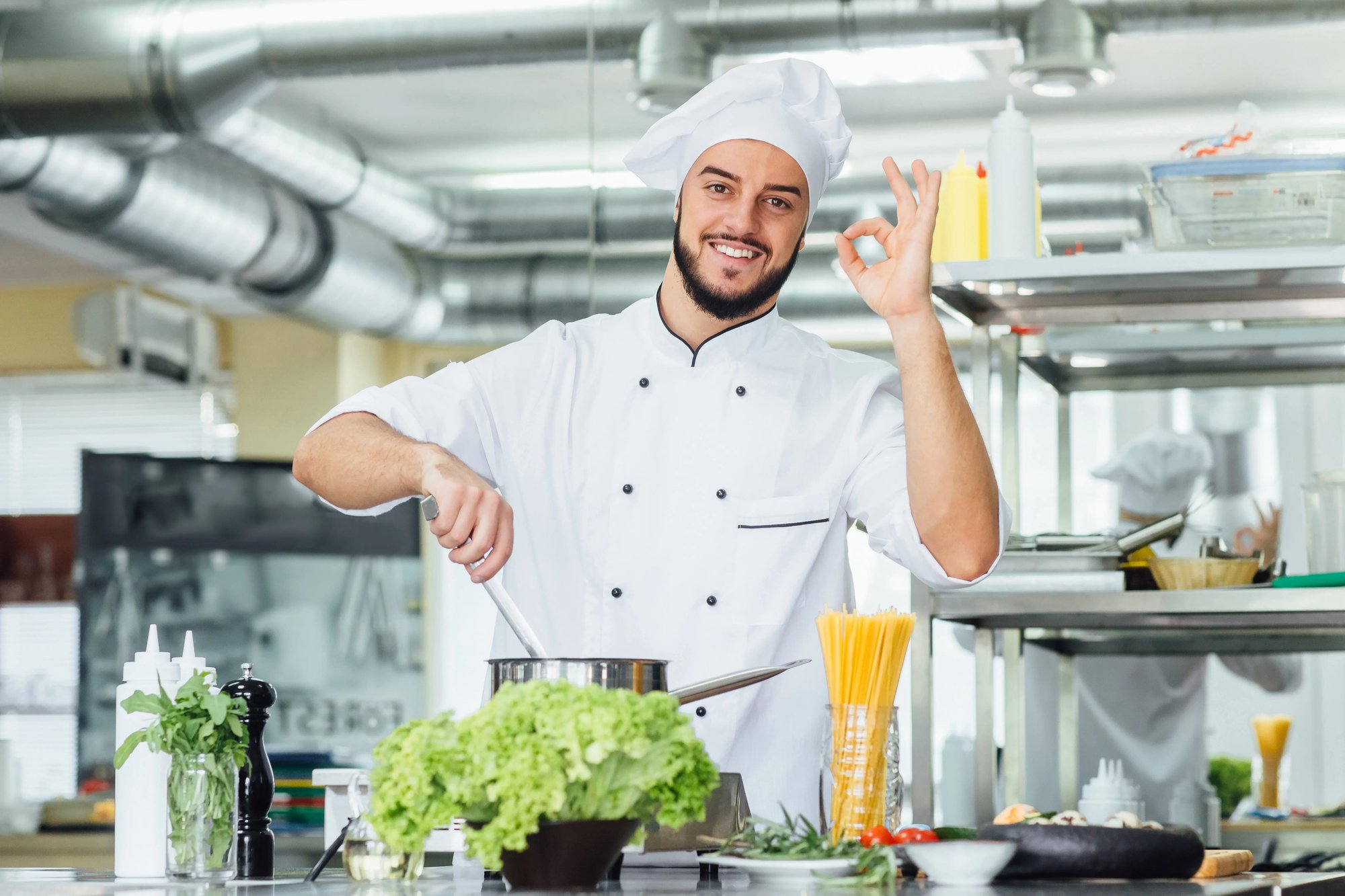 portrait-handsome-bearded-man-chief-cook-holding-saucepan-make-okay-sign