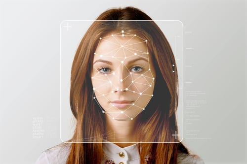 serious-business-woman-smart-technology-face-recognition-double-exposure(1)